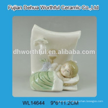 Ceramic decoration with baby figure